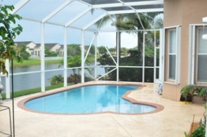 The pool in the Miami sun room provides moisture for orchids 