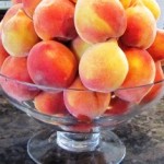 Fresh Elberta peaches are firm and juicy, perfect for summer dessert