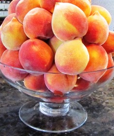 Fresh Elberta peaches are firm and juicy, perfect for summer dessert