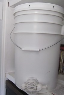 Honey bucket makes it easy to drain honey into jars