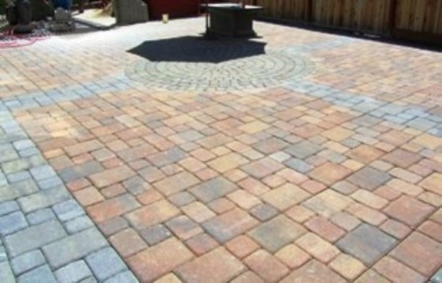 This patio floor that my husband recently laid required several stone shapes and two colors--gray and terra cotta