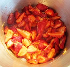 strawberries (here, sliced, not crushed) marry with the lemon peel strips for flavor