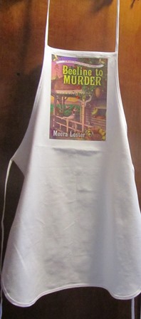 I wore an apron bearing my book cover while I helped stuff bags with lavender and rosemary