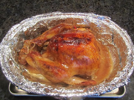 Basted turkey is ready to slice